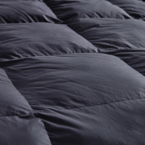 Your Comforter is a Thermostat: Choosing Weight and Fill for a Heated Home